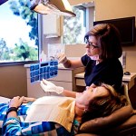 staff member showing patient his x-rays